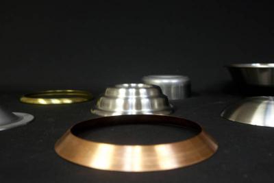 A range of materials Wenzel Metal Spinning can work with: steel, stainless steel, aluminum, brass, copper and galvanized